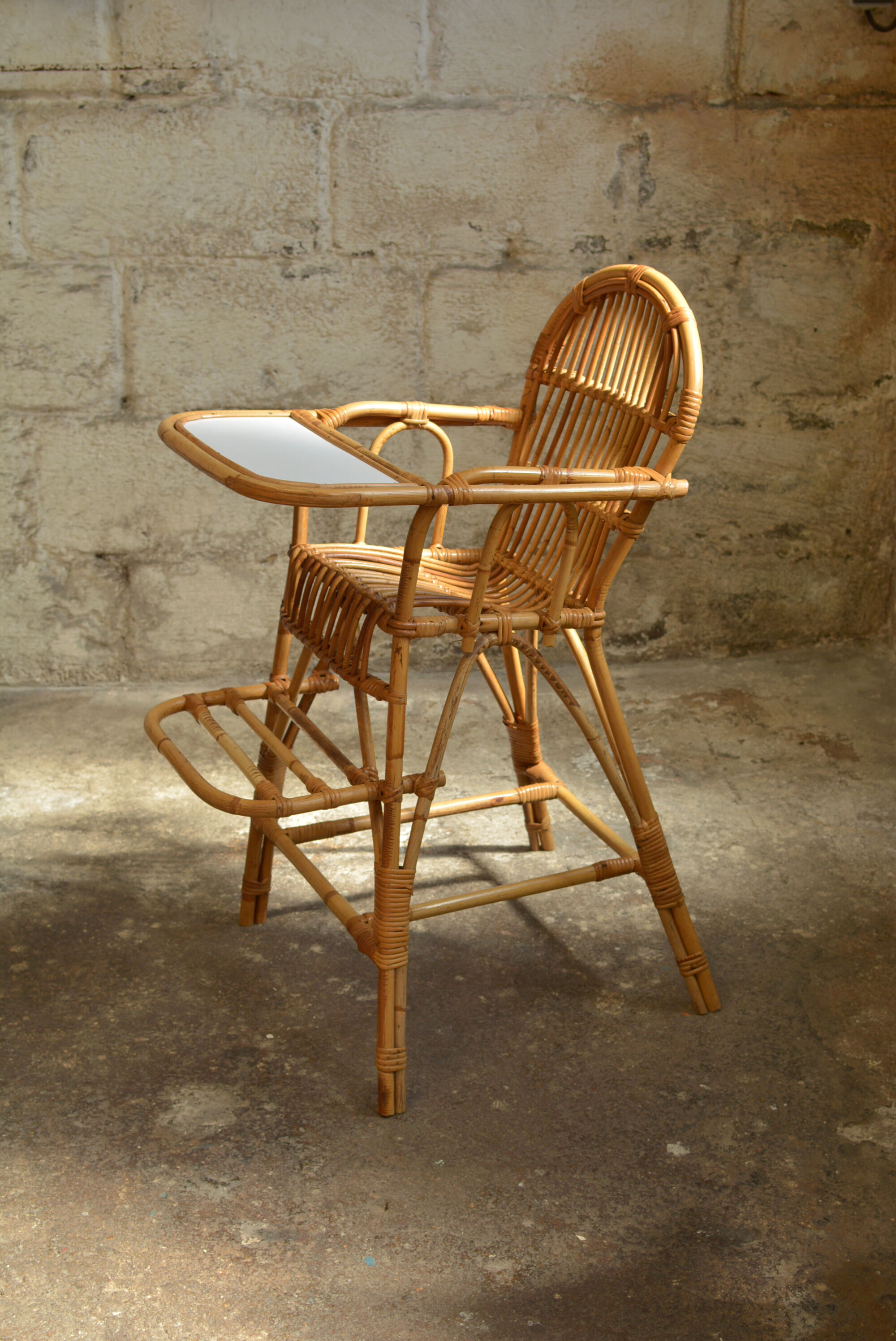 Vintage rattan high chair