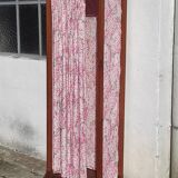 Old wardrobe in old wood and vintage fabric
