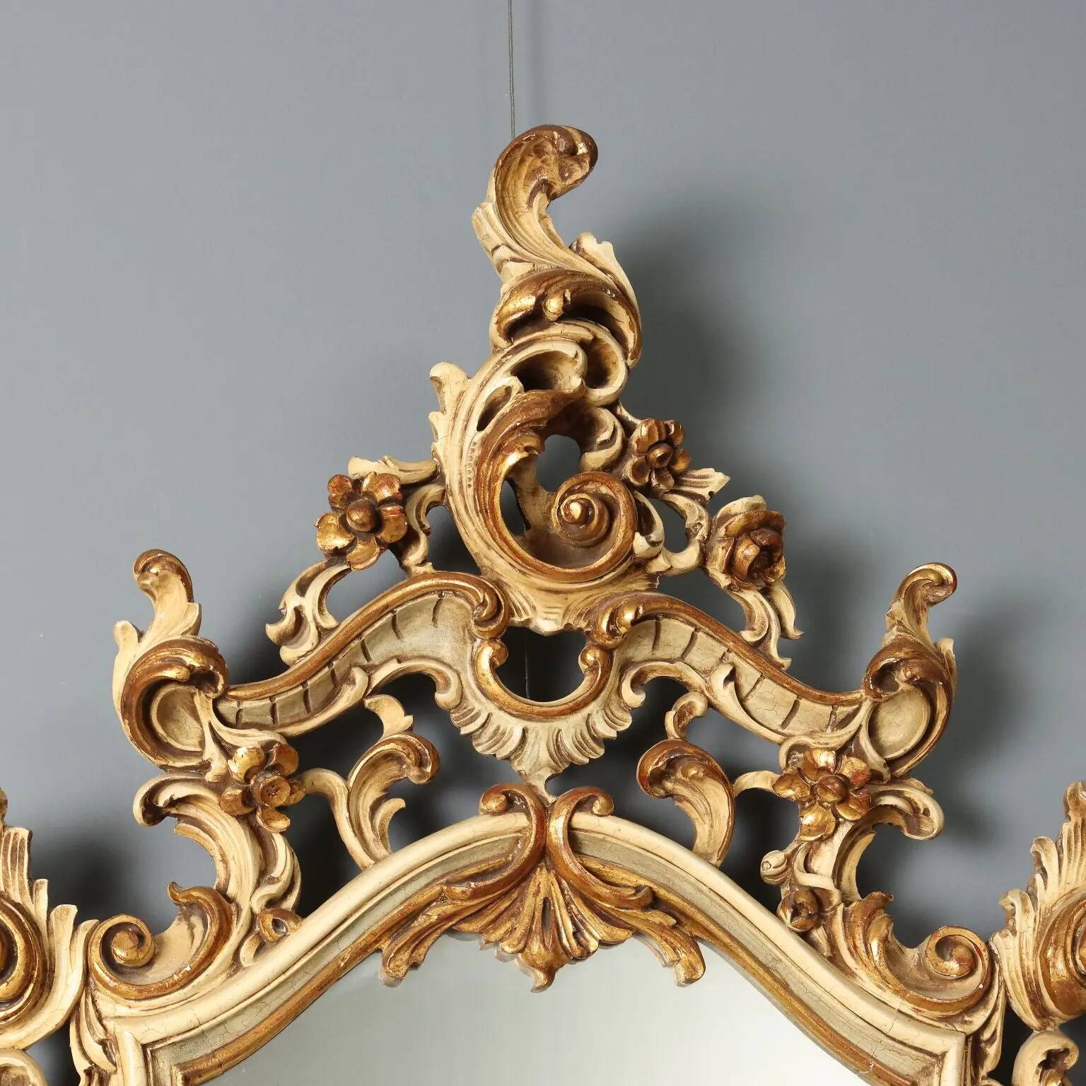 Antique lacquered and gilded wooden mirror, Italy, early 20th century.