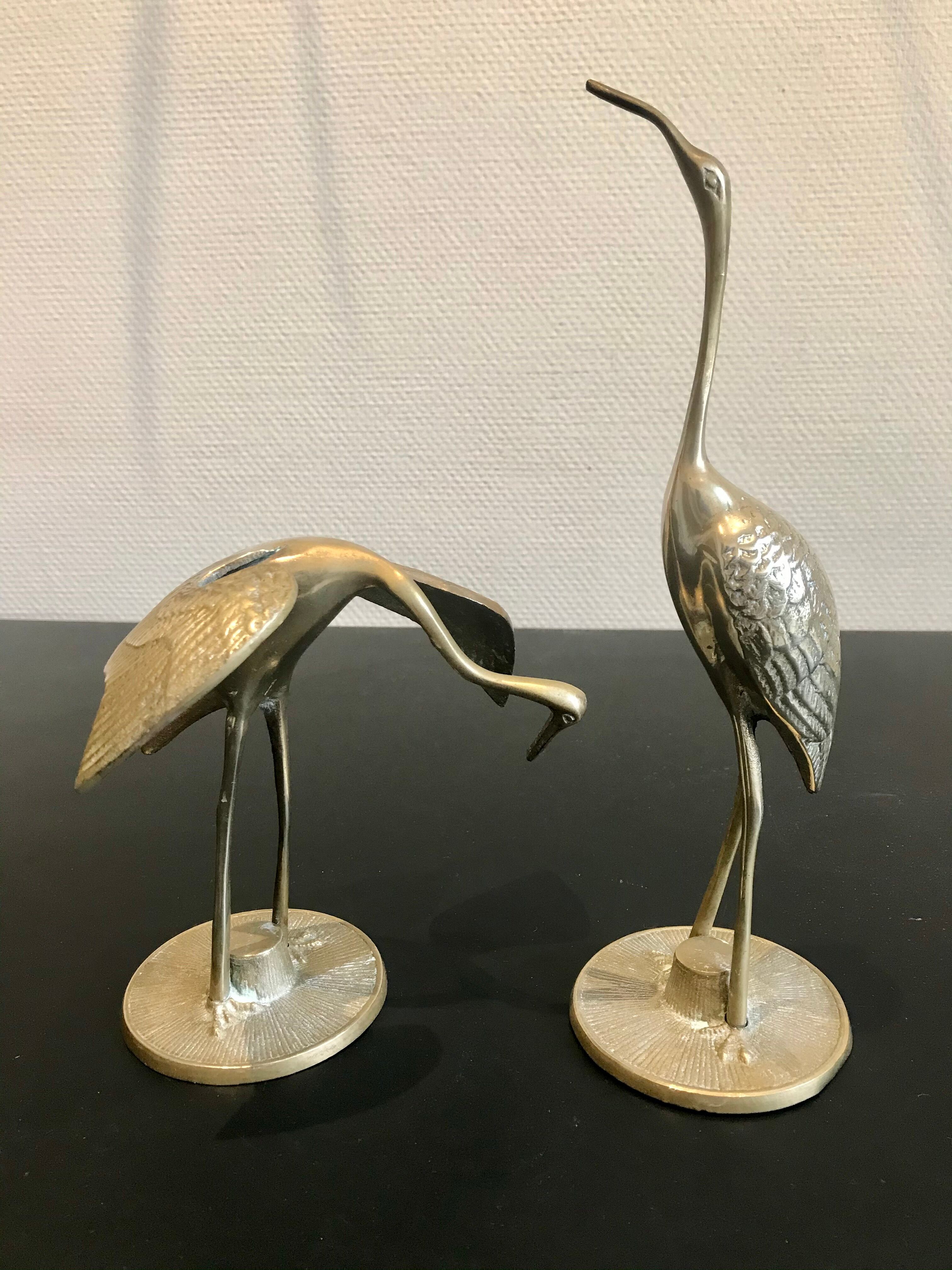 Couple of brass birds