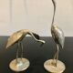 Couple of brass birds