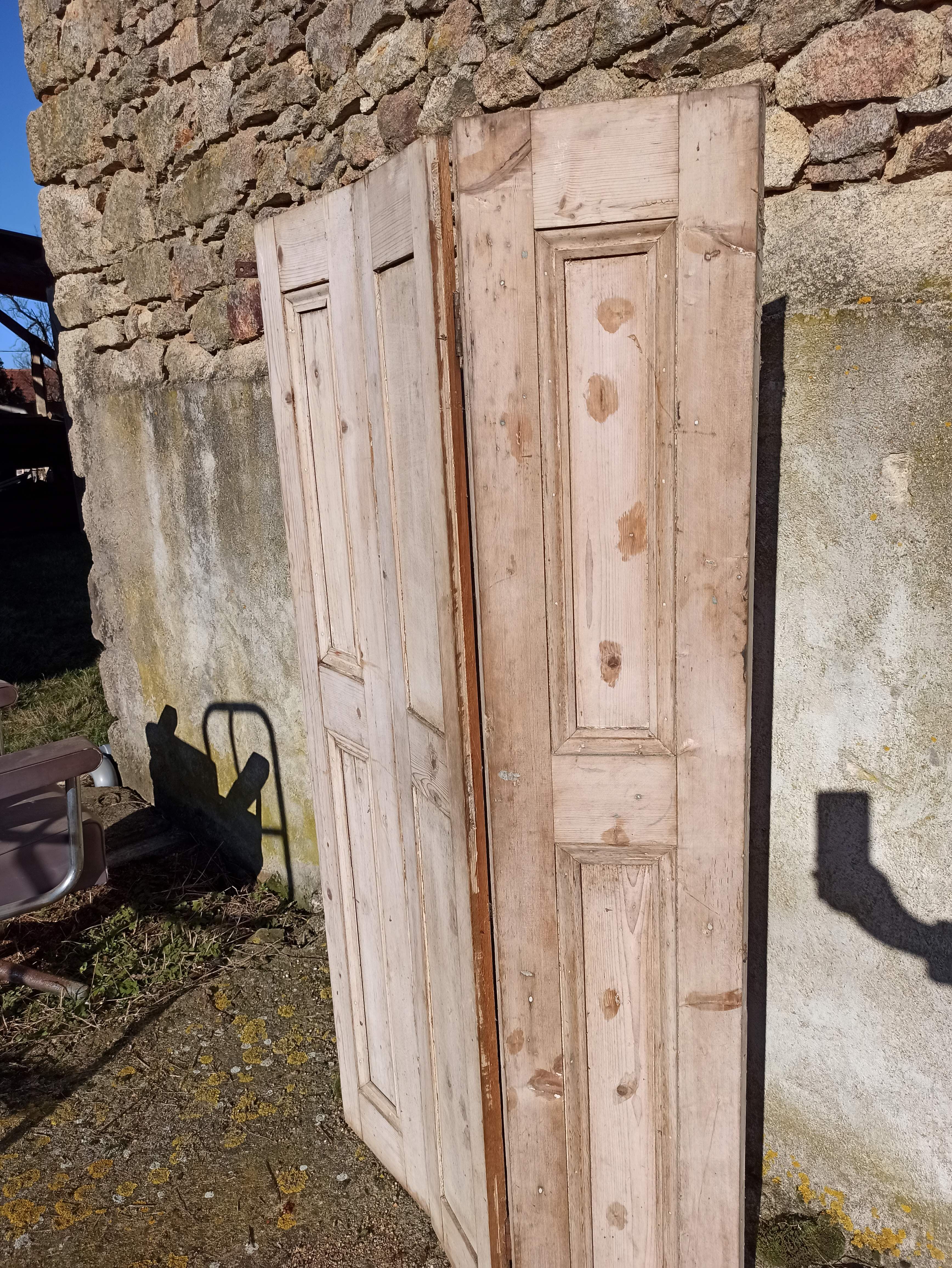 Old trio of wooden screen doors