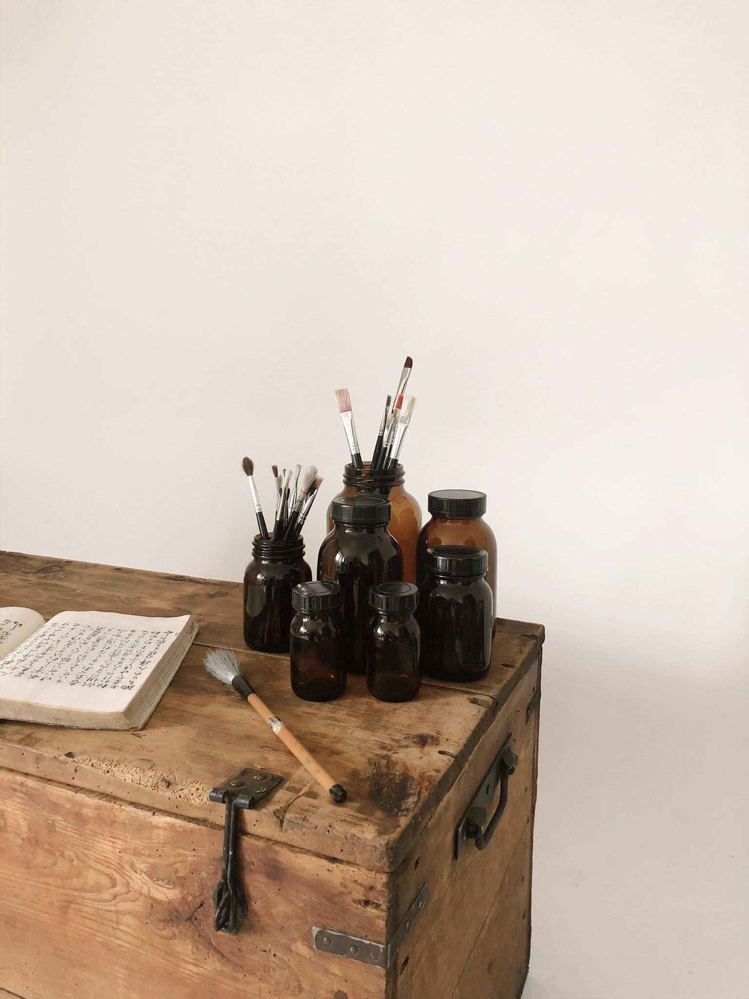 Lot of 7 bottles of amber glass apothecary style