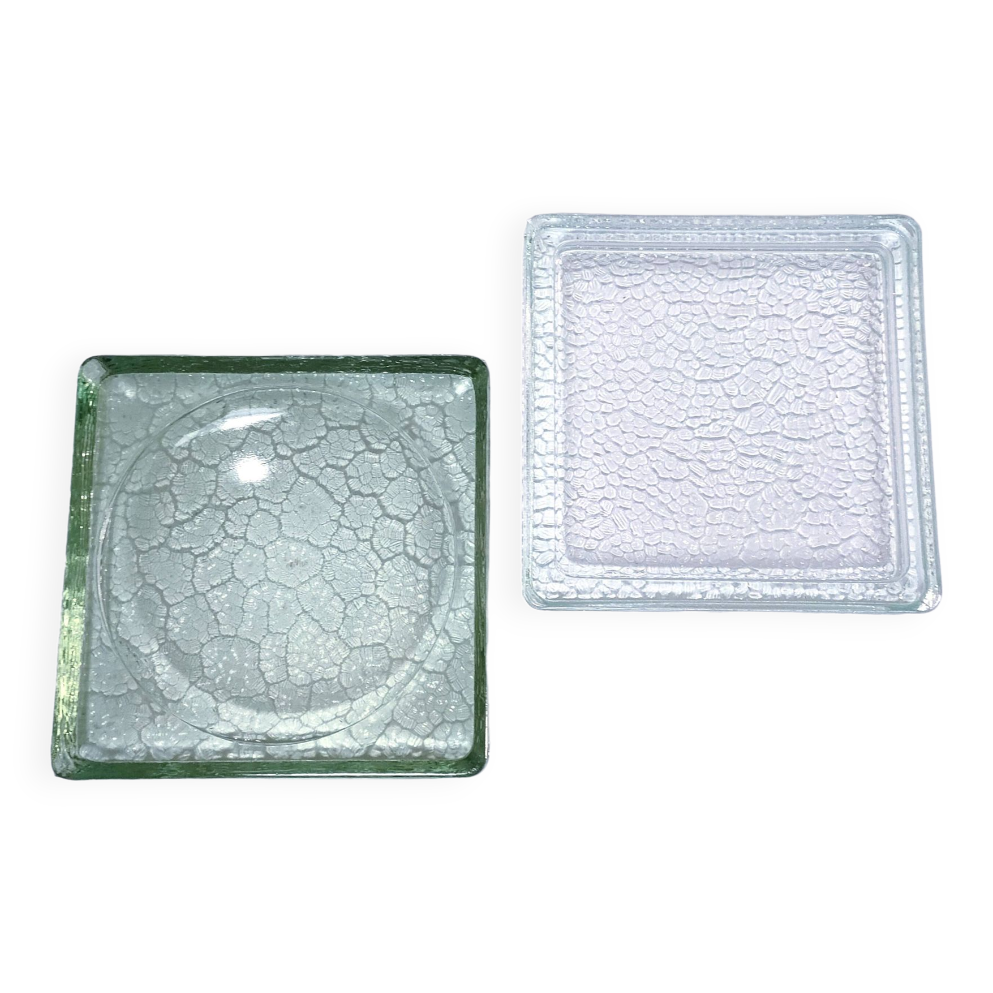 Two designer glass paving pockets