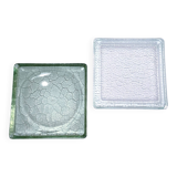 Two designer glass paving pockets