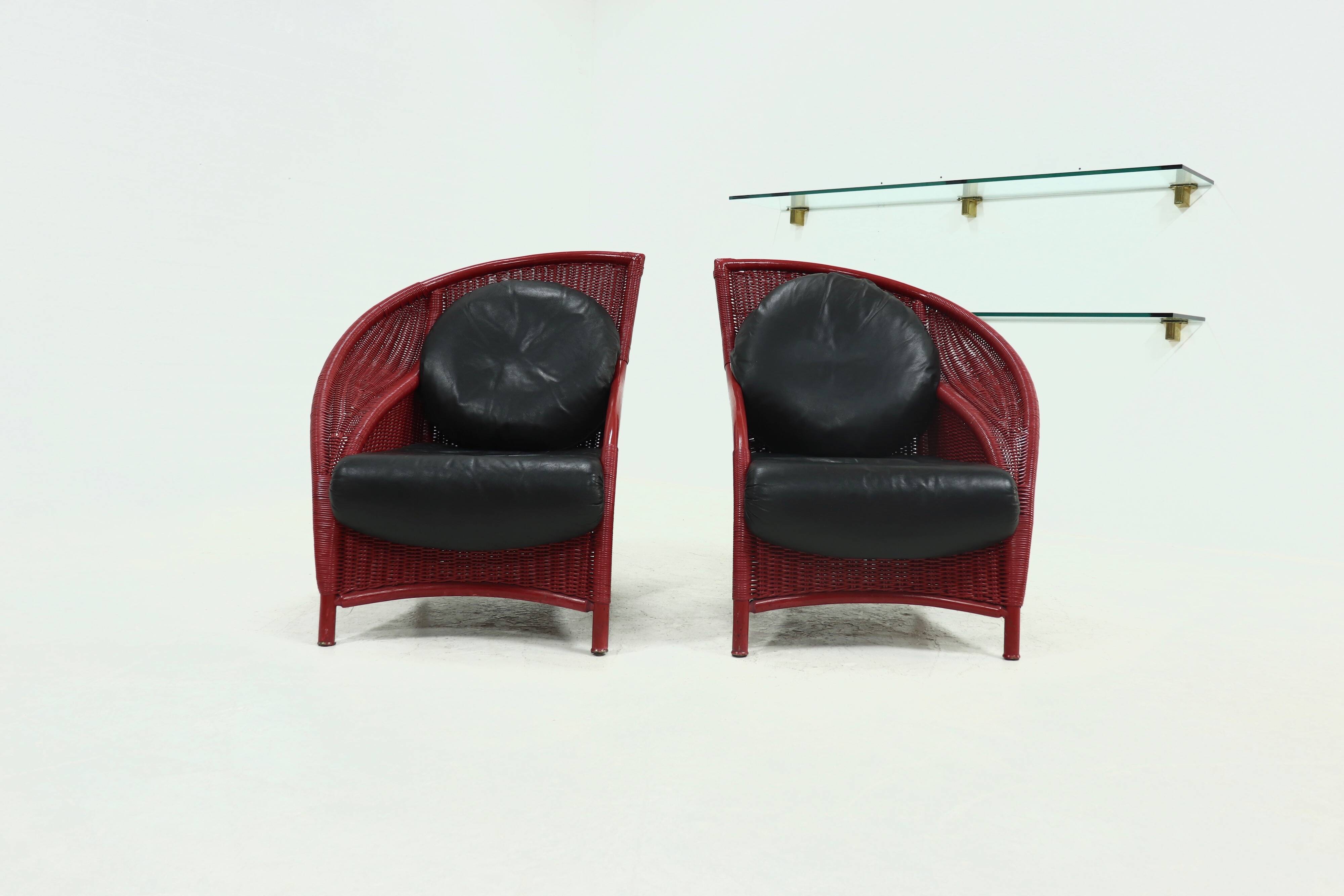 Set of 2 Sculptural Lounge Chairs in Red Lacquered Rattan 1970s