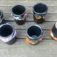 Six vintage glazed ceramic glasses