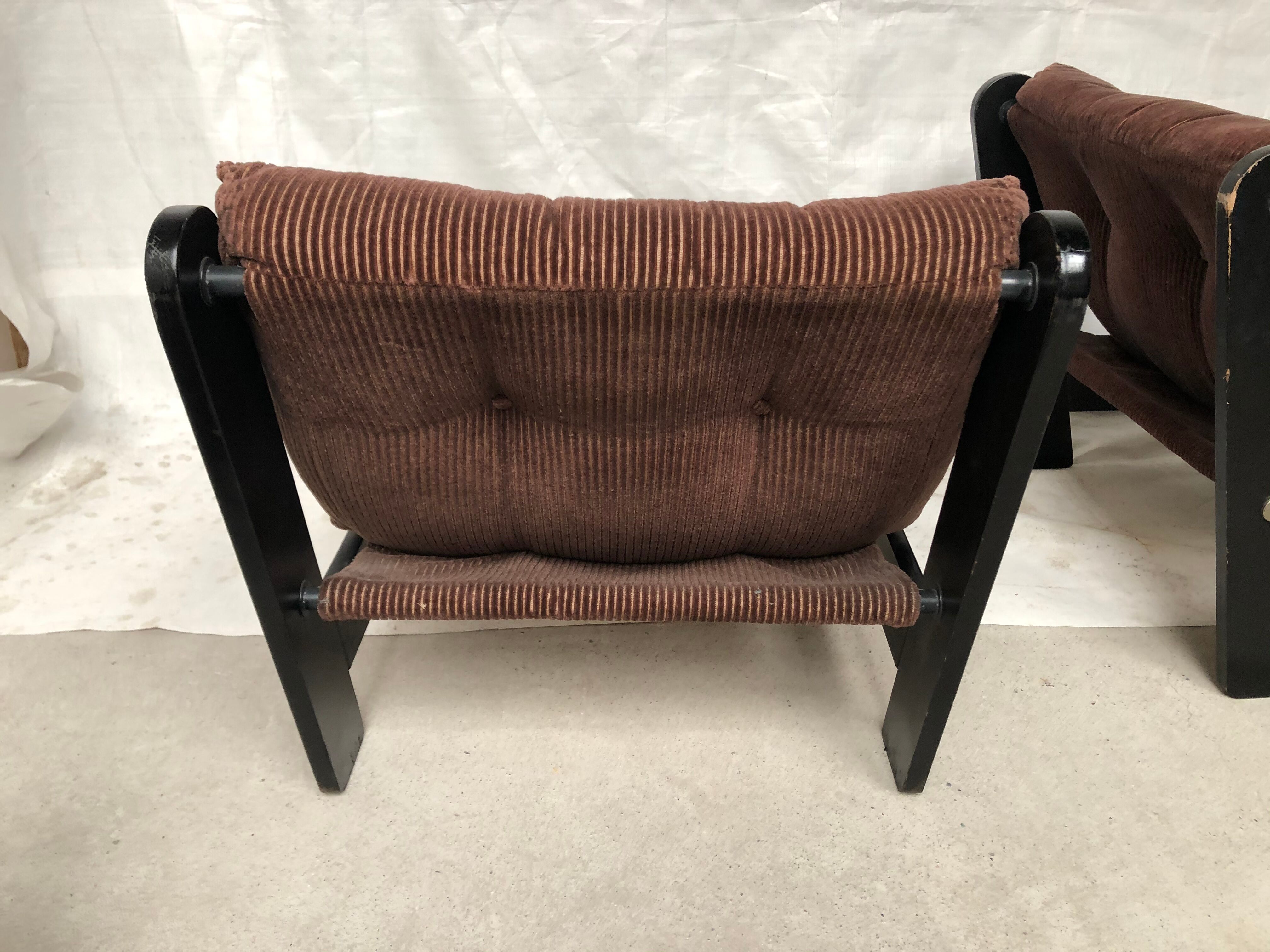 Modernist armchairs wood heaters and brown velvet vintage 70s