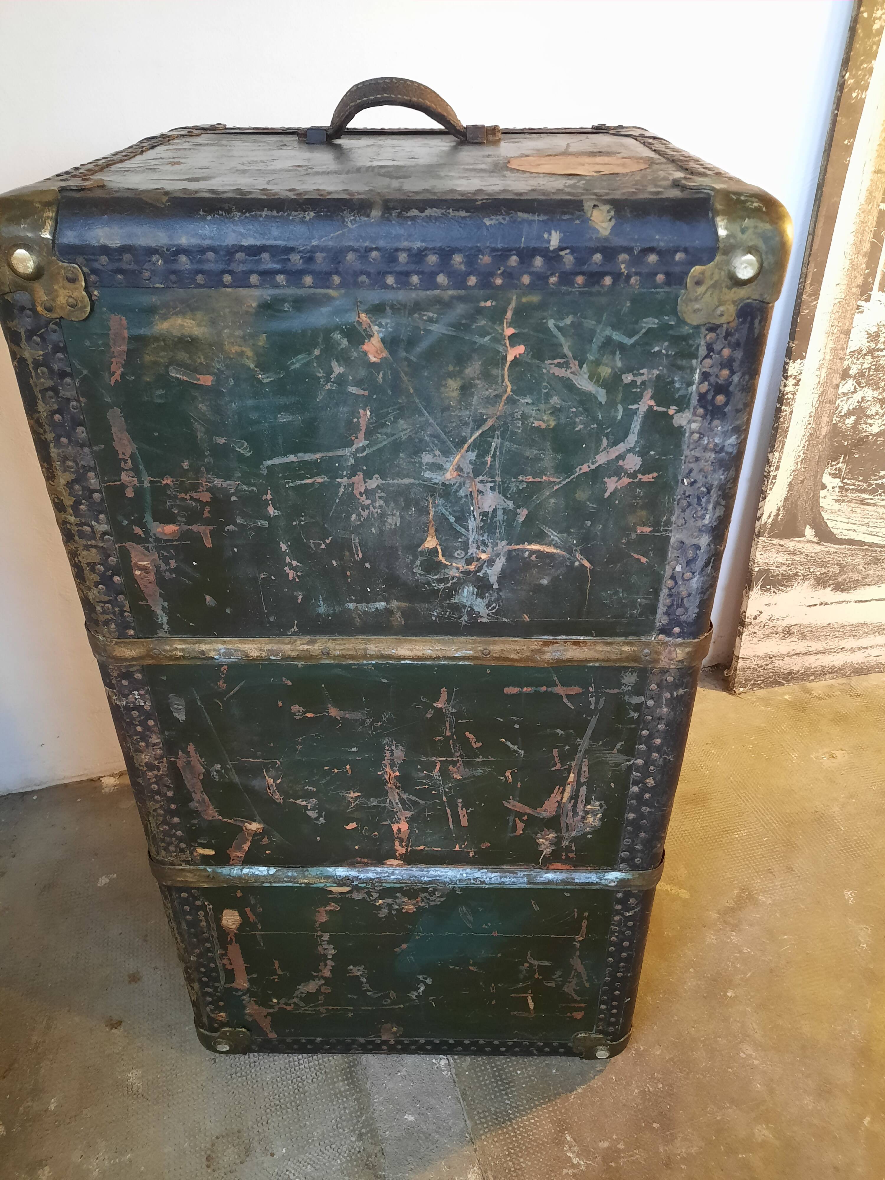 Old and large travel trunk, brass-plated corners