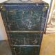 Old and large travel trunk, brass-plated corners