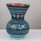 Nice oriental vase, black geometric patterns on blue background, vintage