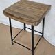 Old workshop stool in wood + wrought iron
