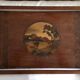 Old wooden serving tray with marquetry drawing