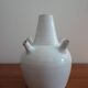 White enamelled earthenware flower vase signed HR