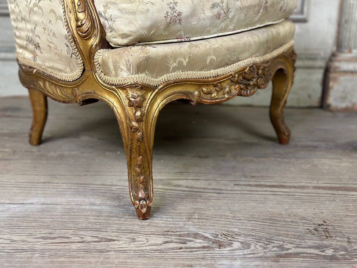 A Louis XV style child's bergère chair in carved and gilded wood, circa 1880