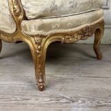 A Louis XV style child's bergère chair in carved and gilded wood, circa 1880