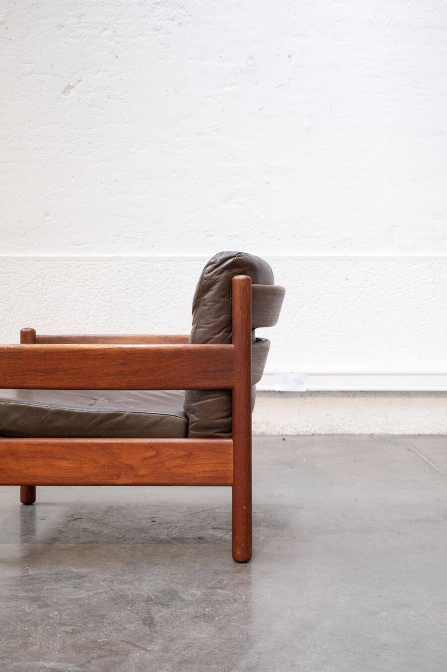 Teak and leather armchair