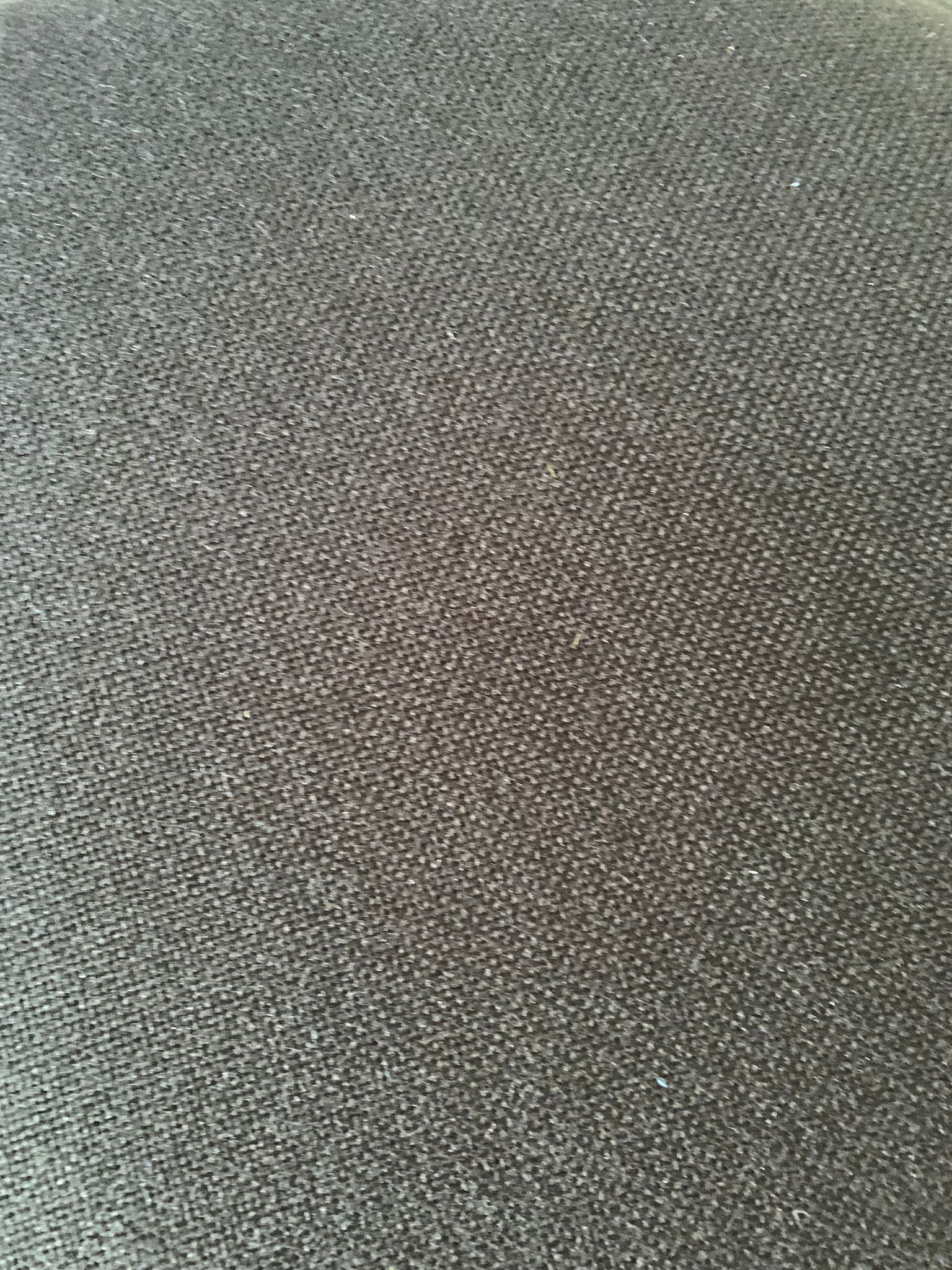 Black dining room table, wooden, rectangle with upholstered chairs.