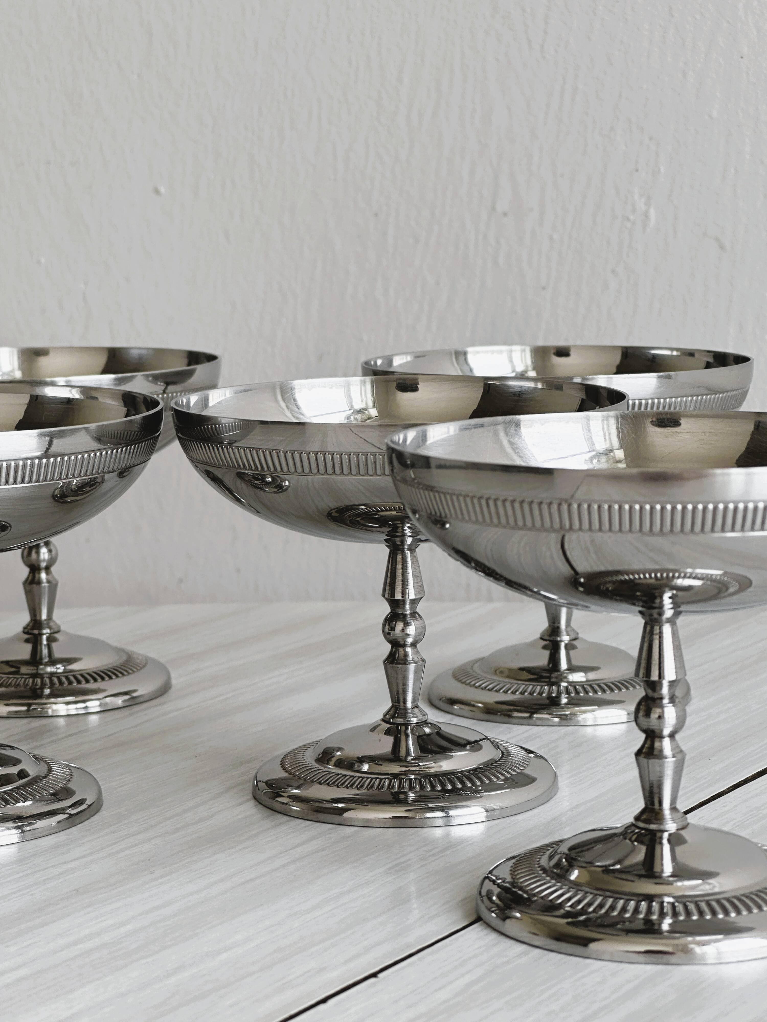 5 silver-plated metal cups
