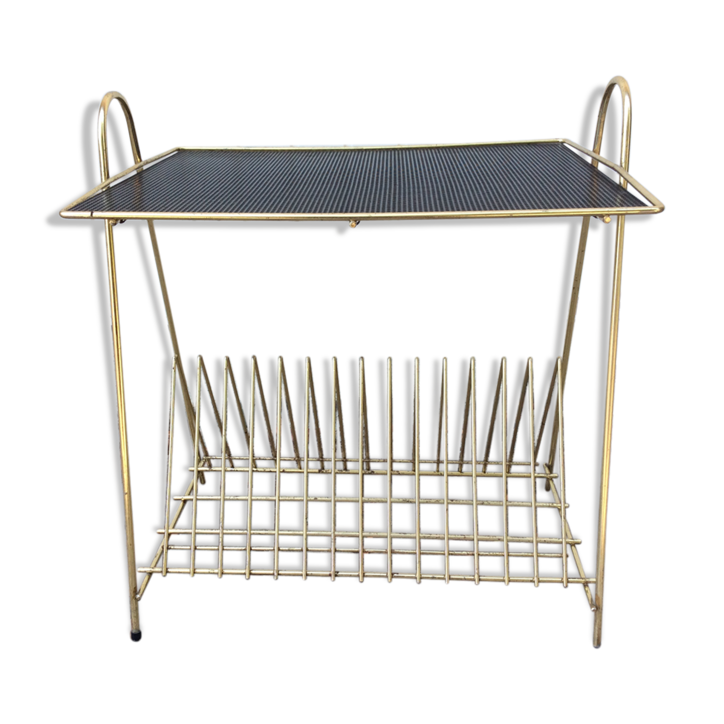 Side table wearing vinyl or journals