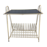 Side table wearing vinyl or journals