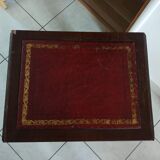 Old game table on top of leather
