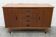 1960s teak sideboard with 4 drawers, 2 doors, and a mirror.