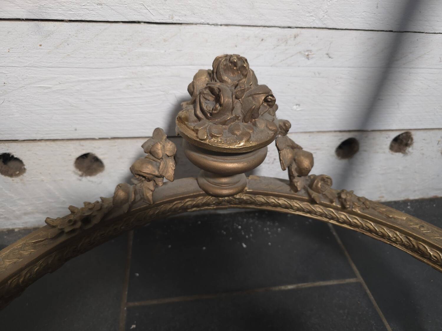 Louis XVI style console in gilded wood with a marble top.
