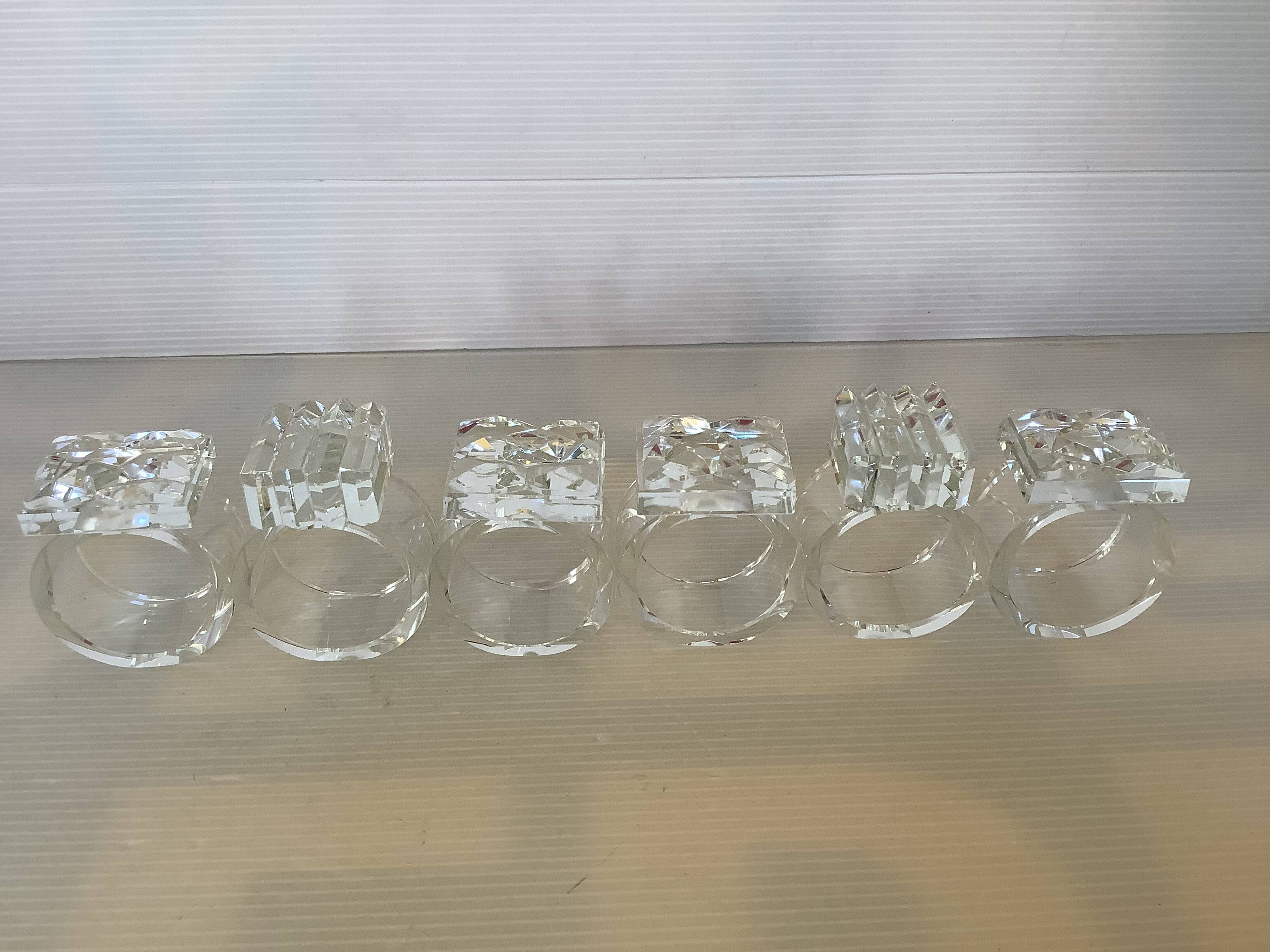 Six glass napkin rings