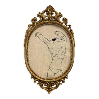 Broderie encadrée
