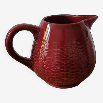 Glazed porcelain pitcher