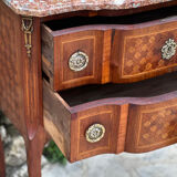 Small jump cabinet in precious wood marquetry.
