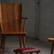 Danish sculpted oak stool from the mid-20th century with a red leather seat, 1950s.