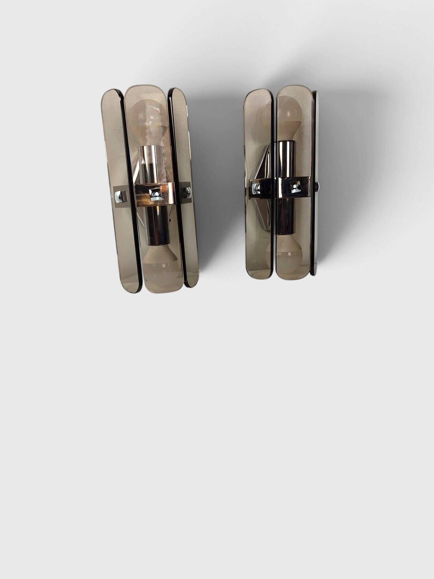 Pair of smoked glass and chrome wall lights attributed to Fontana Arte – Years