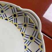 Lot de deux plats en terre de fer années 30