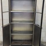 Riveted metal display cabinet library