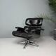Chaise longue Eames entièrement noire par Herman Miller, années 1970.