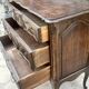 Carved and moulded solid wood commode in the Louis XV style.