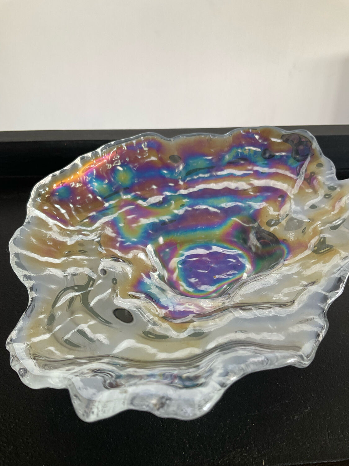 Empty vintage pocket in iridescent glass