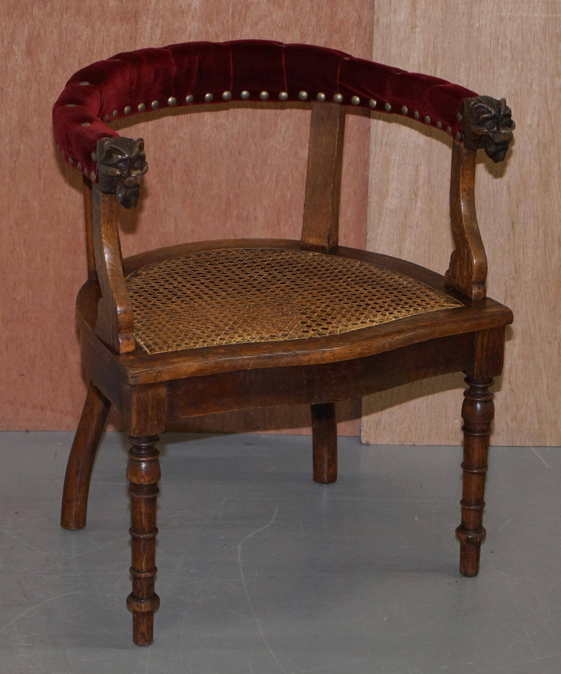Antique Régence Bergère Armchair in Carved Oak with Lion Head Armrests