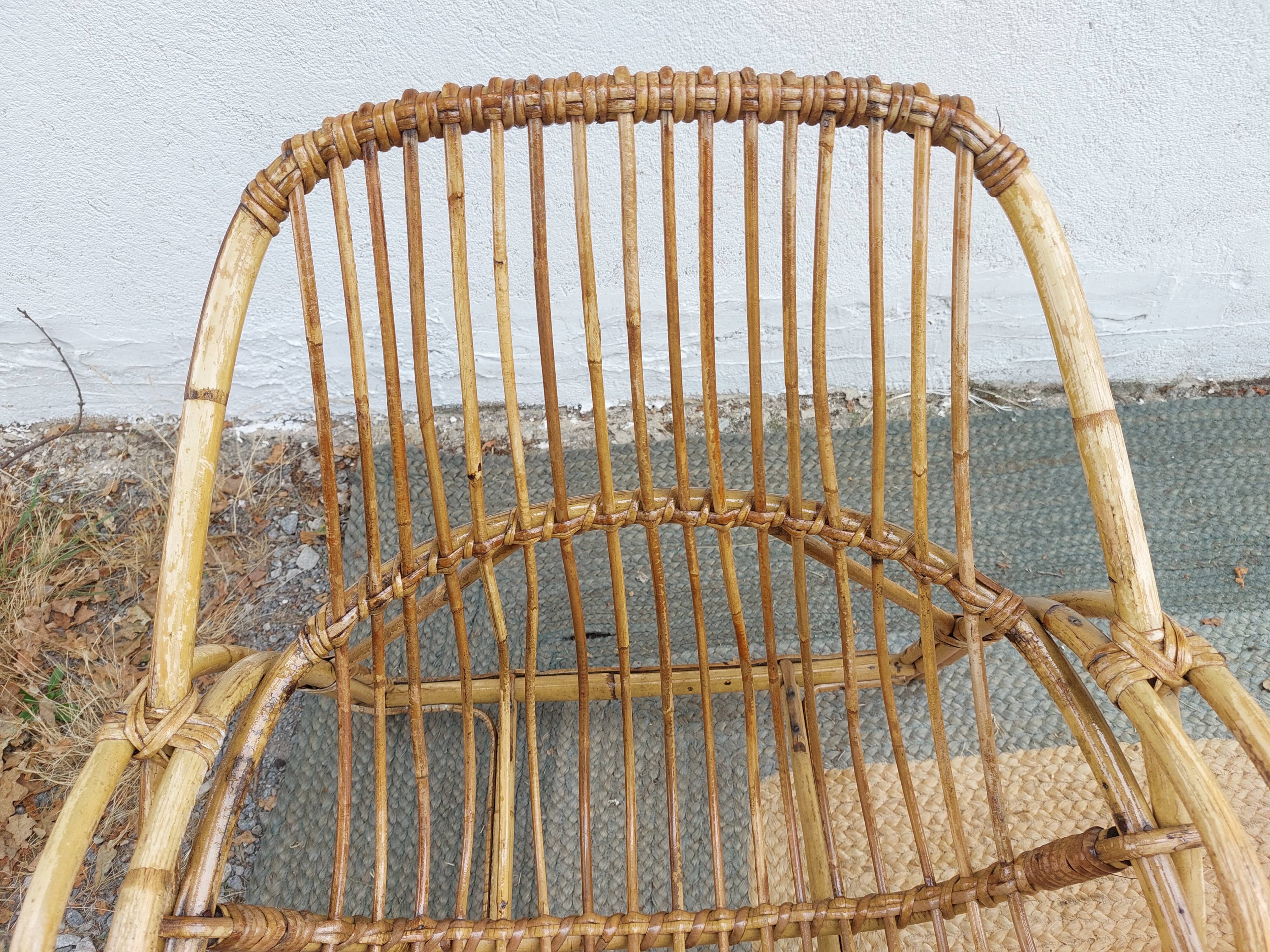 4 armchairs and a coffee table made of rattan and bamboo wood, vintage.