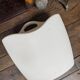 Design magazine rack in milky white by Elie Jacobson