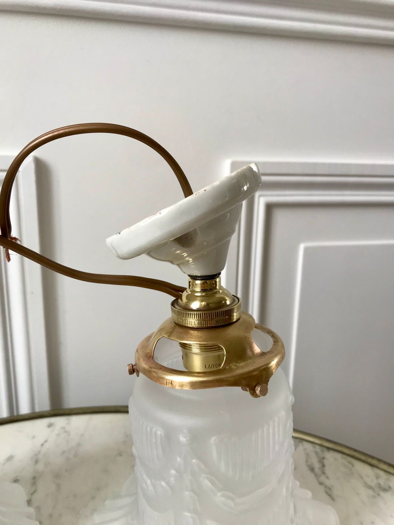 Pair of tulip wall lamps in molded glass on porcelain support 20s