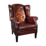 Patinated sheepskin armchair