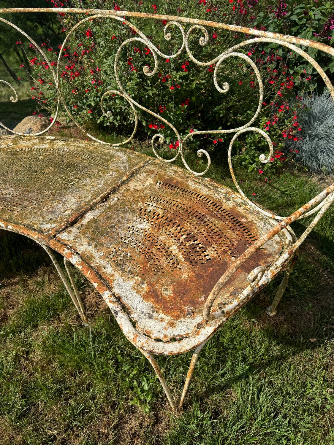 Wrought iron half-moon bench