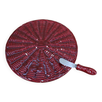Burgundy slip tray and its small vintage knife from the 50s