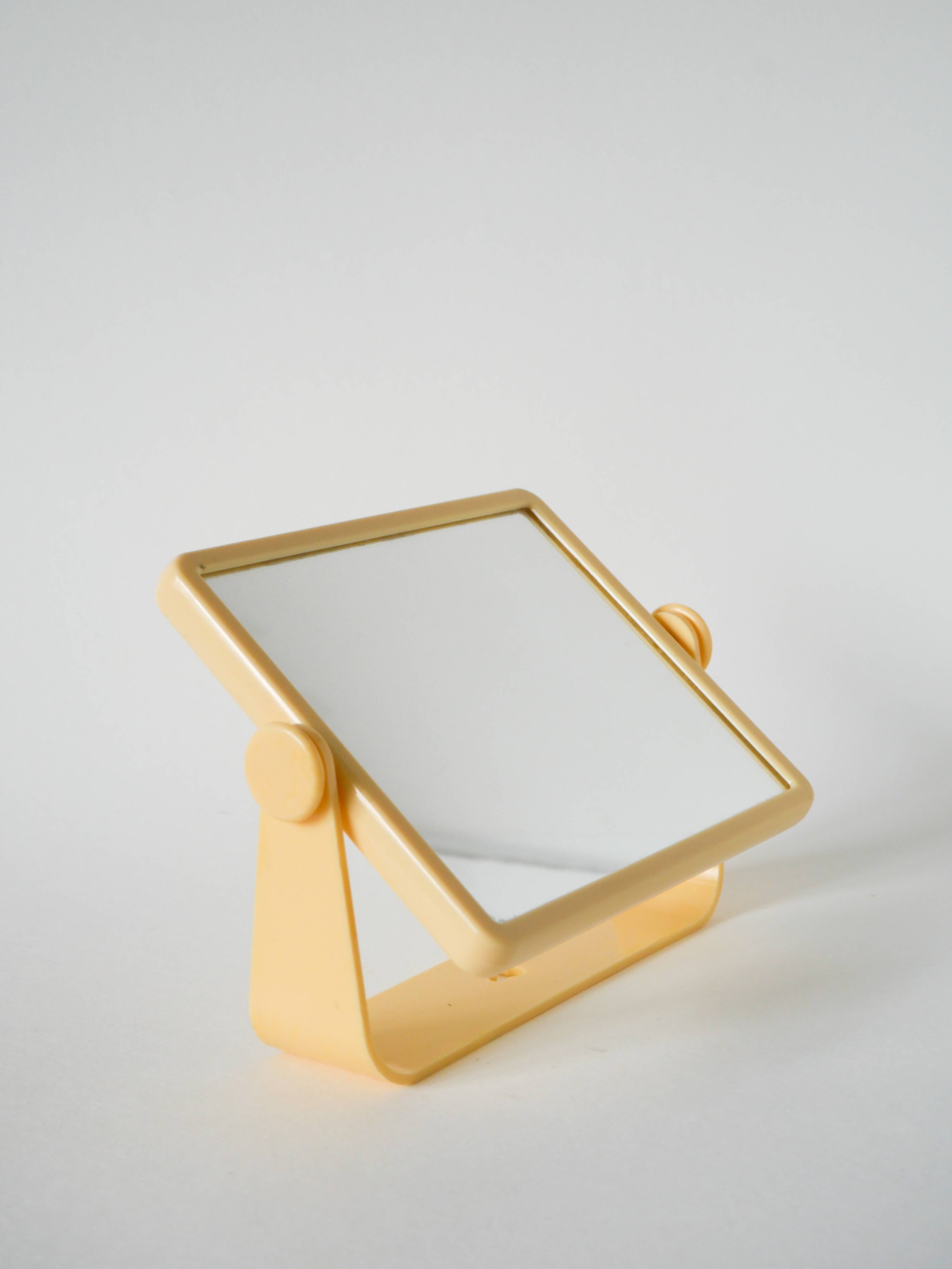 Small cream plastic bathroom mirror to attach, 1970s