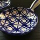Pair of blue decorated fondue pots