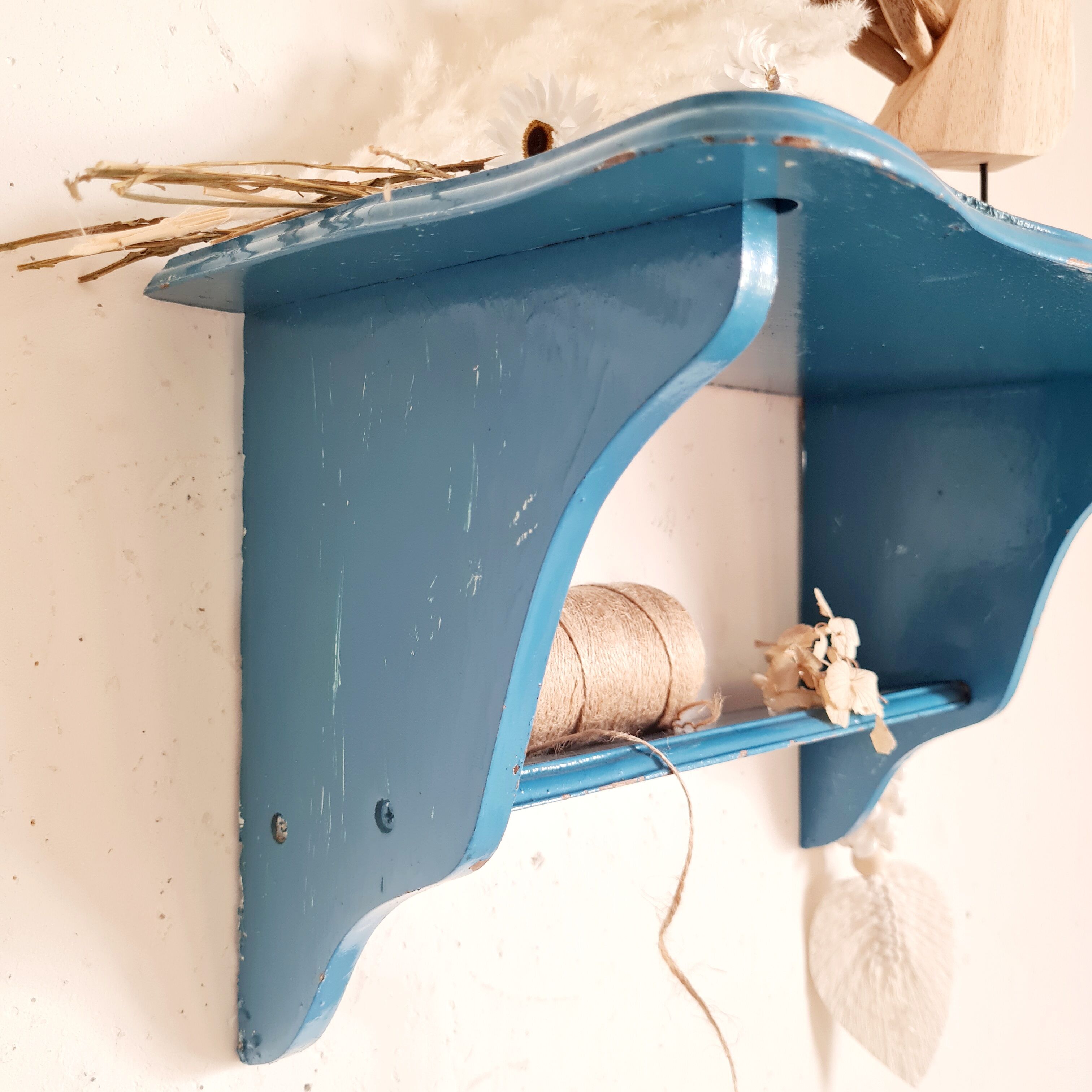 Blue wood wall shelf