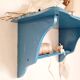 Blue wood wall shelf